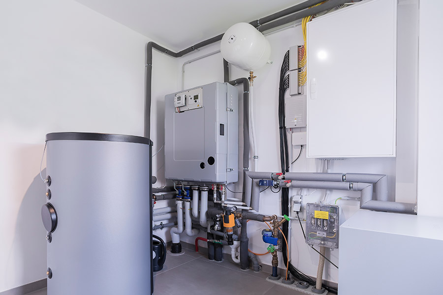 Modern residential boiler system with connected pipes and controls